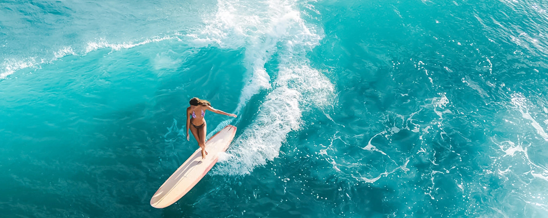 a woman surfing in the sea